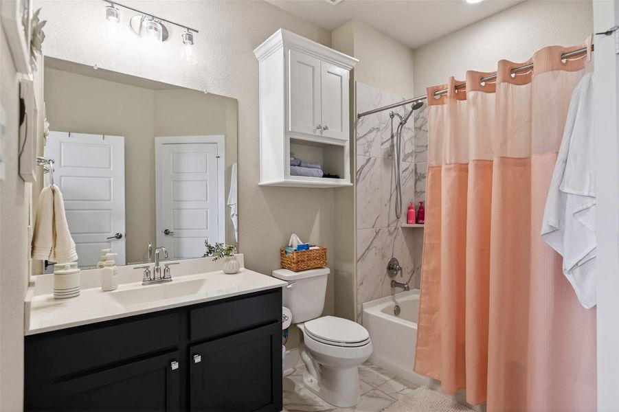 Furnished interior view inside a new home in Lone Star Landing, Montgomery (Image 32).