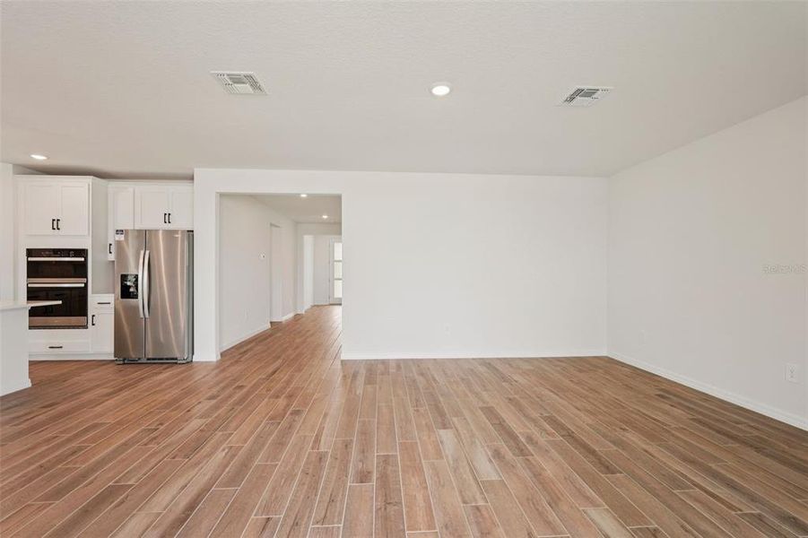 Spacious, unfurnished interior of a new home in Oakfield Trails - Signature Series, Parrish (Image 12).