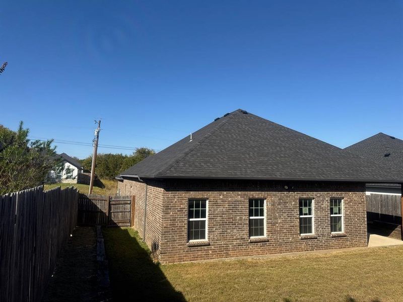 Exterior details and patio area of a home in , Granbury (Image 21). Exterior details and patio area of a home in , Granbury (Image 21).