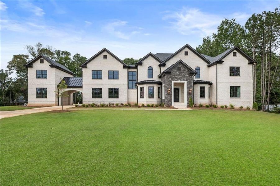 Front exterior of a new home in , Milton, GA, highlighting curb appeal (Image 24).