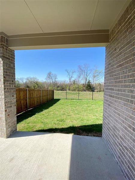 Covered back patio would be perfect for BBQ