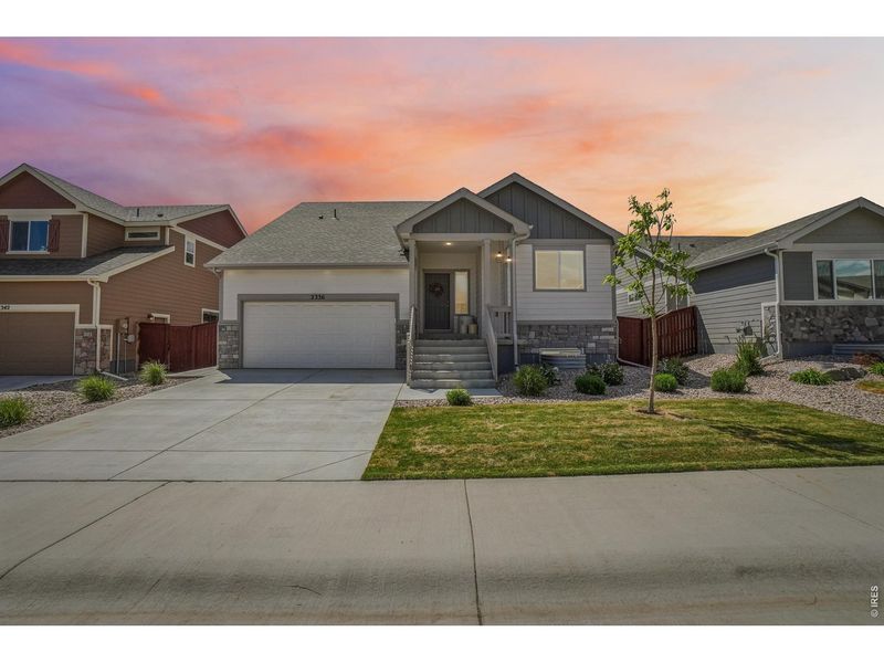 Front exterior of a new home in , Windsor, CO, highlighting curb appeal (Image 23).