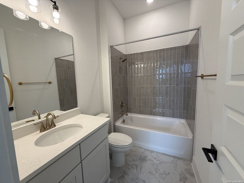Furnished interior view inside a new home in Caliza Reserve, Boerne (Image 9).