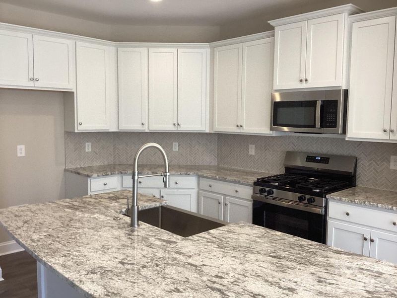 Gourmet Kitchen with Oversized Island