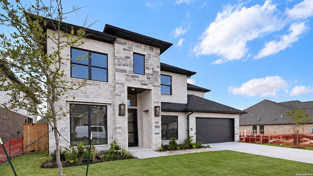 Front exterior of a new home in Mayfair, New Braunfels, TX, highlighting curb appeal (Image 2).