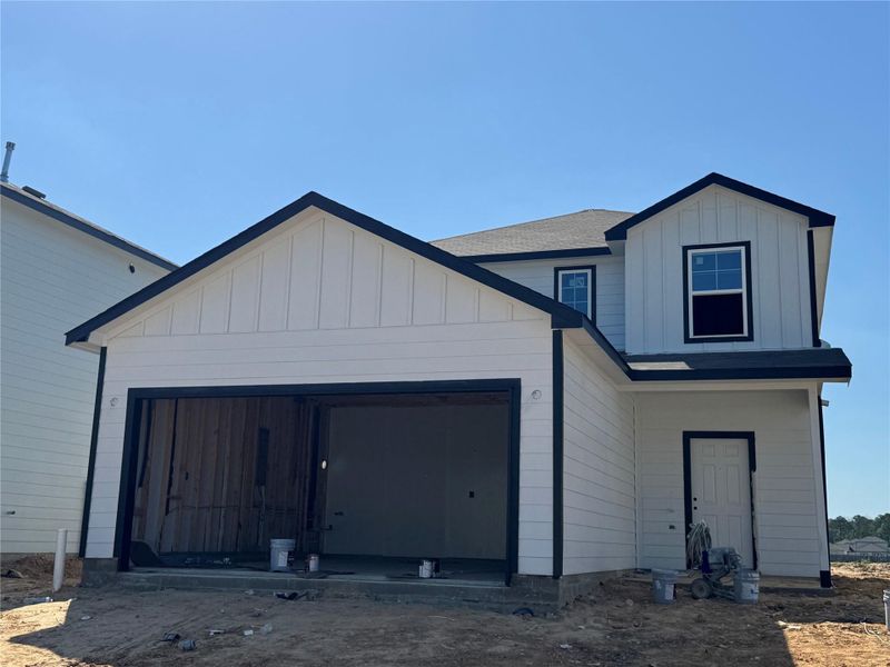 In-progress construction of a new home in Maple Heights, Porter, TX (Image 20).
