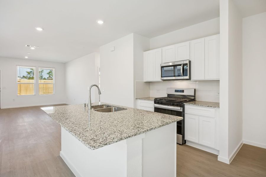 Furnished interior view inside a new home in Decker Farms, Magnolia (Image 13).