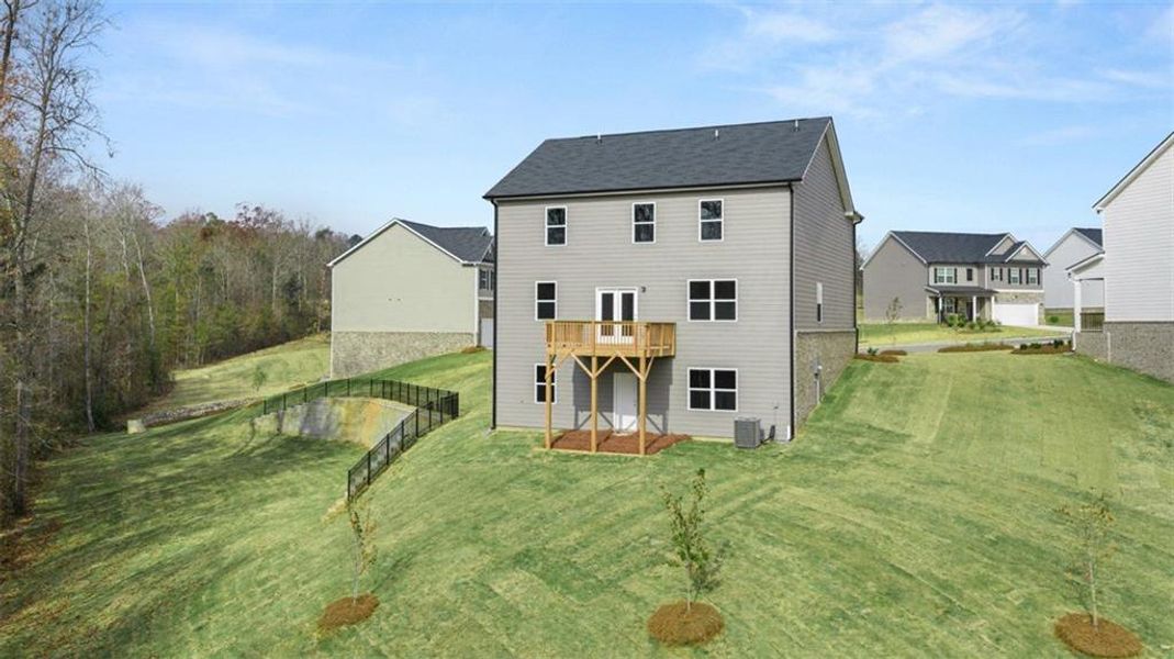 Exterior details and patio area of a home in Locust Grove Station - Cedar Ridge, Locust Grove (Image 3).