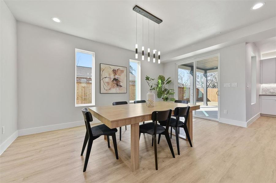 Dining area featuring light wood-type flooring