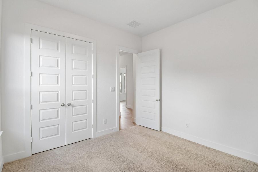 Spacious, unfurnished interior of a new home in The Grand Prairie 60', Hockley (Image 23).