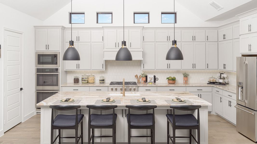 Representative furnished interior of a home built from the 3433W by Perry Homes in Palmera Ridge 70', Leander (Image 4).