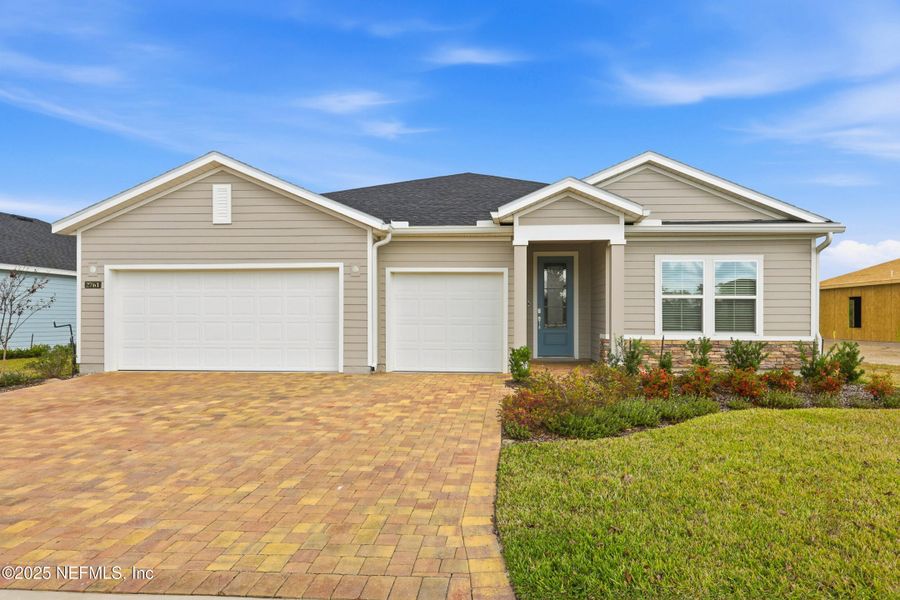 Front exterior of a new home in Edenbrooke at Hyland Trail | 55+: Edenbrooke at Hyland Trail 60s, Green Cove Springs, FL, highlighting curb appeal (Image 1). Front exterior of a new home in Edenbrooke at Hyland Trail | 55+: Edenbrooke at Hyland Trail 60s, Green Cove Springs, FL, highlighting curb appeal (Image 1).