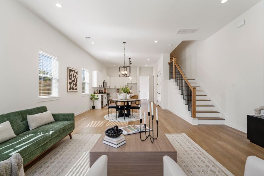 Another view of the living area highlights the open-concept flow.