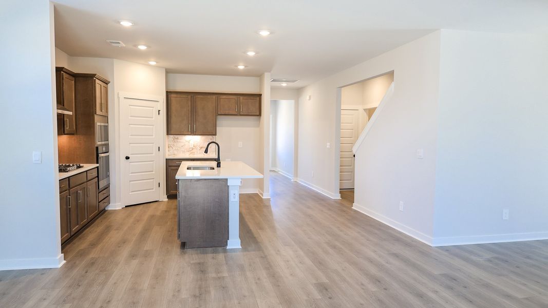 Representative furnished interior of a home built from the EMBRY by D.R. Horton in Harvest Point, Spring Hill (Image 11).