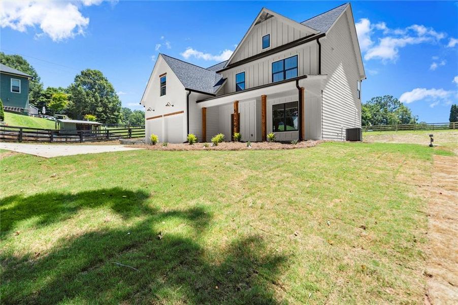 Front exterior of a new home in , Cumming, GA, highlighting curb appeal (Image 25). Front exterior of a new home in , Cumming, GA, highlighting curb appeal (Image 25).