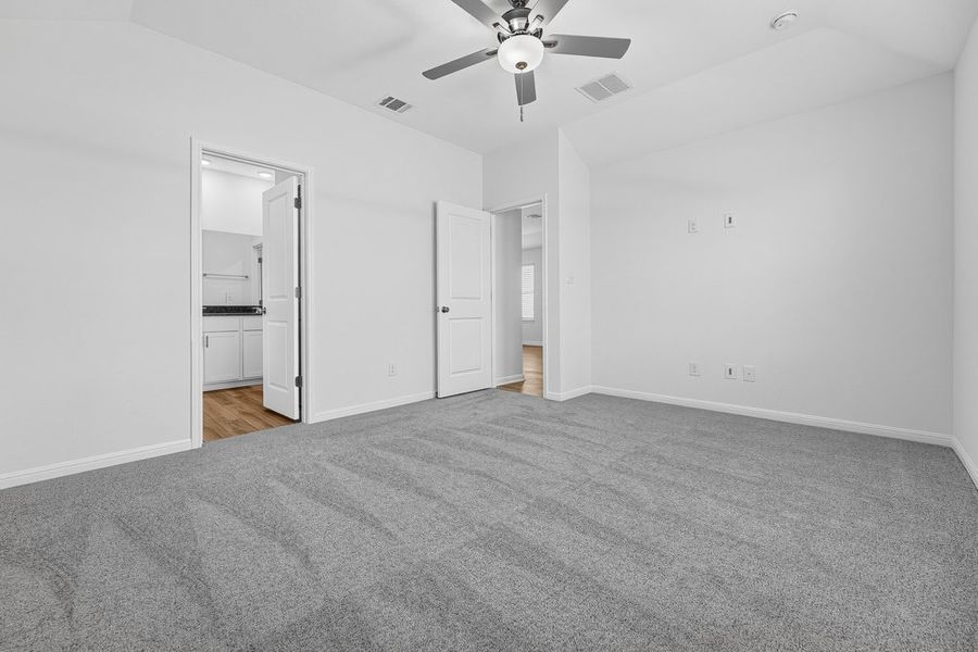 Representative unfurnished interior of a home built from the Capercaillie by Taylor Morrison in Emory Crossing, Hutto (Image 13).