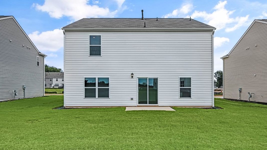 Front exterior of a new home in Wilson's Ridge, Smithfield, NC, highlighting curb appeal (Image 17).