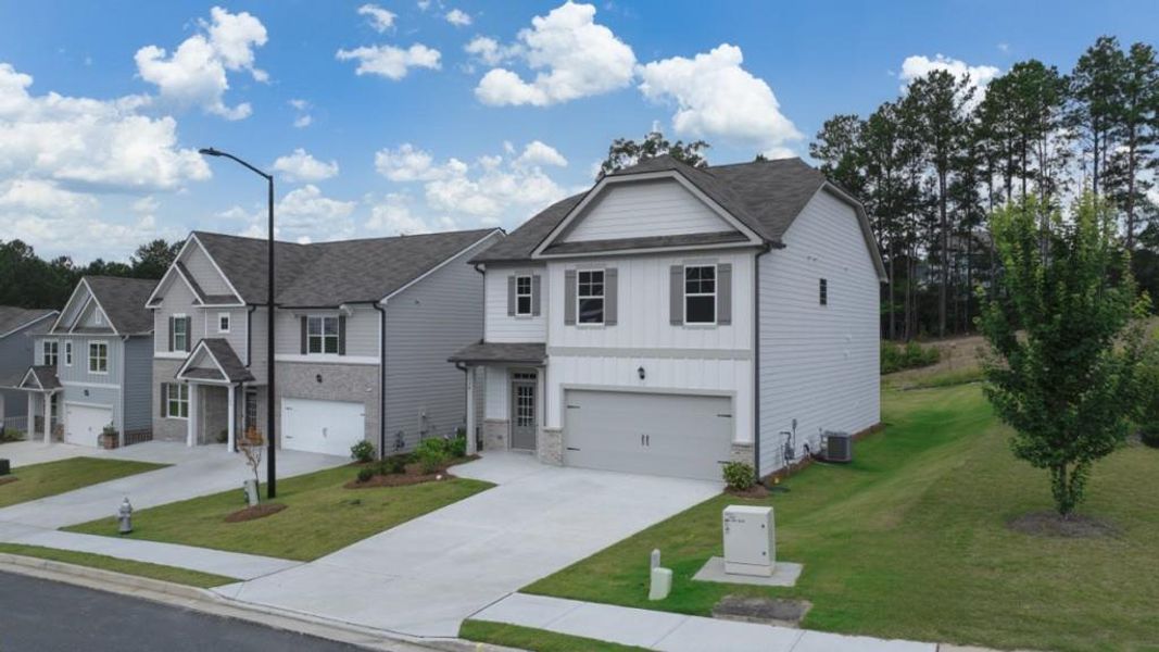 Front exterior of a new home in Lost Creek, Dallas, GA, highlighting curb appeal (Image 2). Front exterior of a new home in Lost Creek, Dallas, GA, highlighting curb appeal (Image 2).
