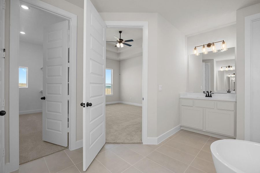 Furnished interior view inside a new home in Lariat, Liberty Hill (Image 9). Furnished interior view inside a new home in Lariat, Liberty Hill (Image 9).