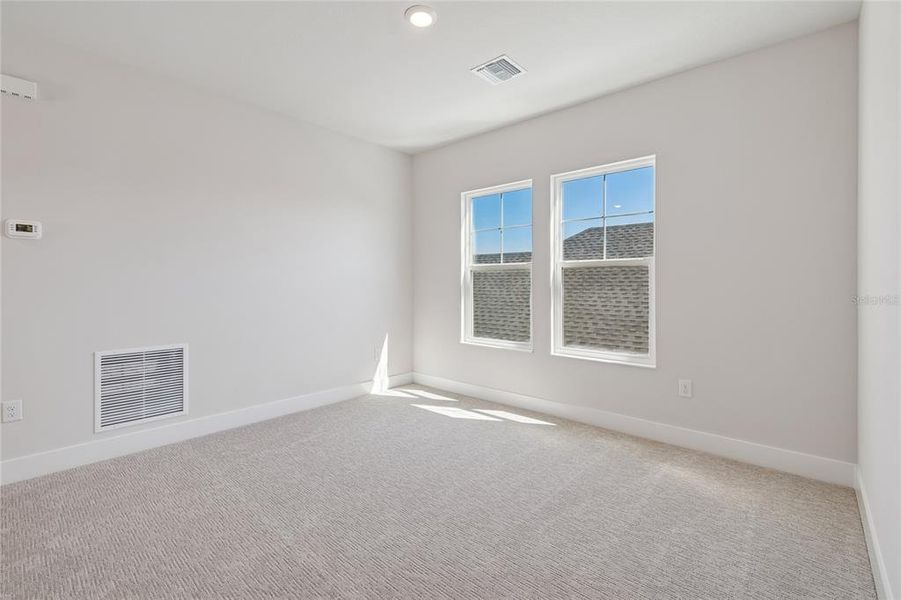 Spacious, unfurnished interior of a new home in Emerald Landing at Waterside at Lakewood Ranch – Cottage Series, Sarasota (Image 37).