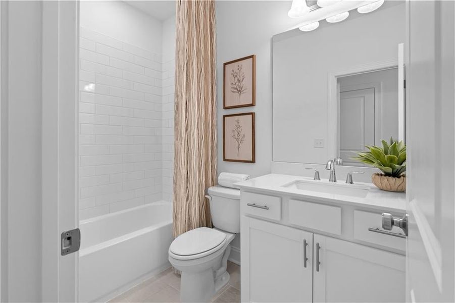 Guest bedroom #2 private full bathroom *Images shown are from a decorated model of the same floor plan. Design selections and color packages will vary by home.* Guest bedroom #2 private full bathroom *Images shown are from a decorated model of the same floor plan. Design selections and color packages will vary by home.*