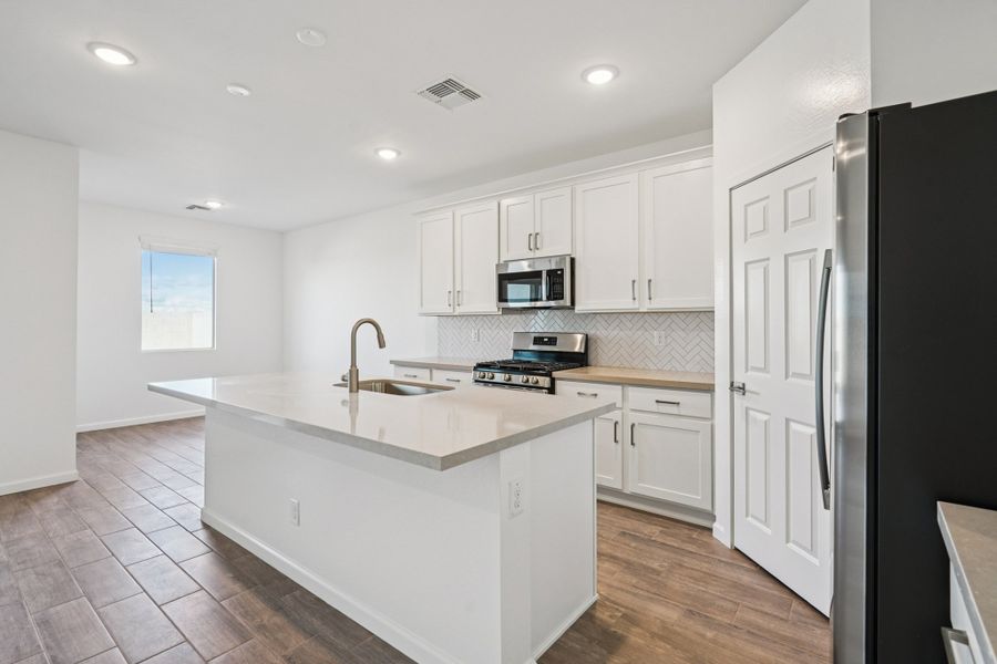 Kitchen and dining featuring the Timeless Collection. Options and finishes may vary by community.