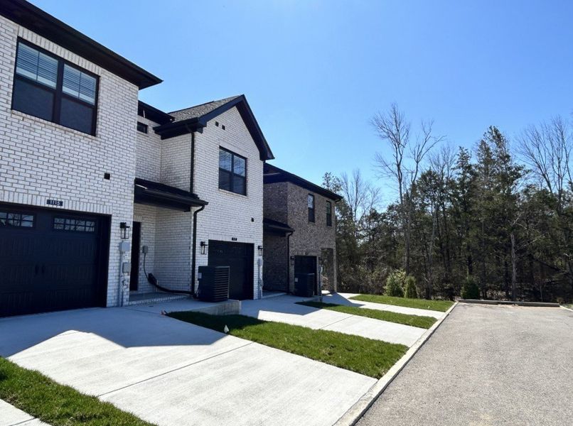 Front exterior of a new home in Lynwood Station, Mount Juliet, TN, highlighting curb appeal (Image 1). Front exterior of a new home in Lynwood Station, Mount Juliet, TN, highlighting curb appeal (Image 1).