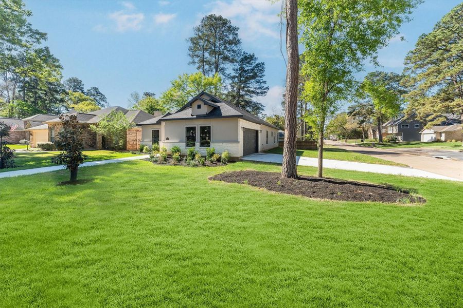 Front exterior of a new home in , Montgomery, TX, highlighting curb appeal (Image 27).