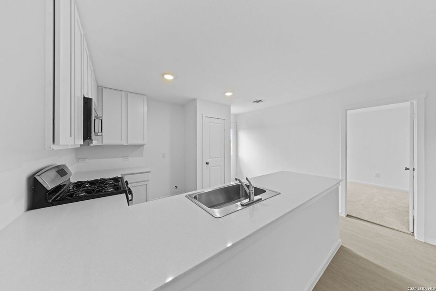 Furnished interior view inside a new home in Spring Grove, St. Hedwig (Image 7).