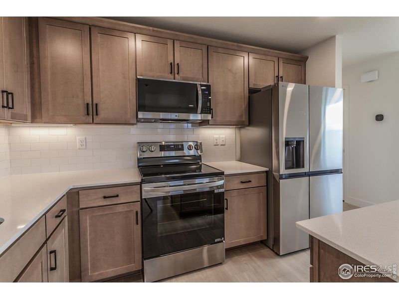 Furnished interior view inside a new home in Prairie Song Story Collection - Single Family Homes, Windsor (Image 29).