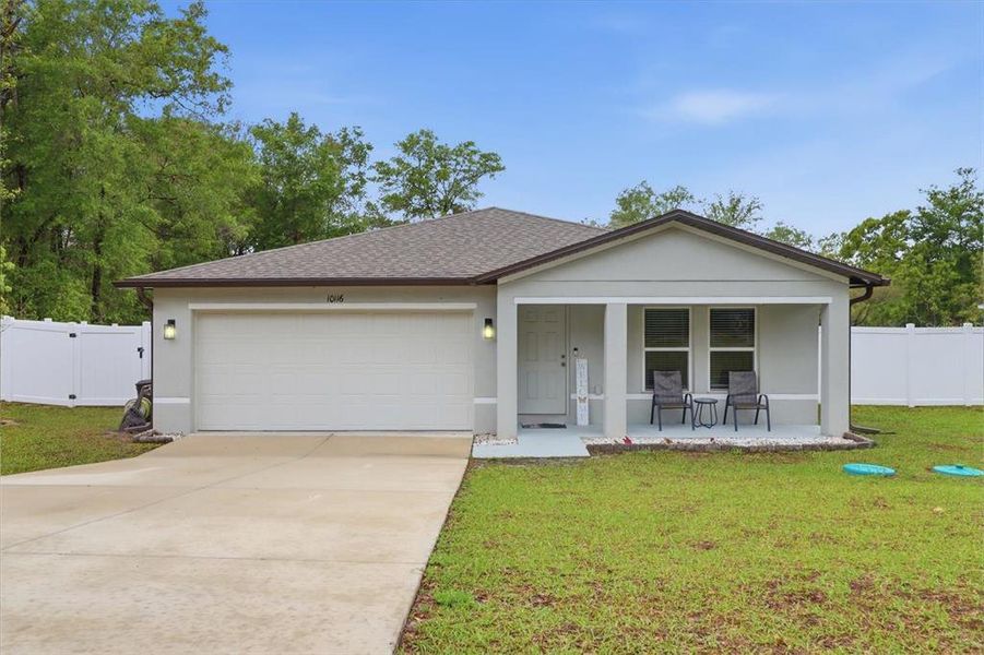 Front exterior of a new home in , Citrus Springs, FL, highlighting curb appeal (Image 2). Front exterior of a new home in , Citrus Springs, FL, highlighting curb appeal (Image 2).
