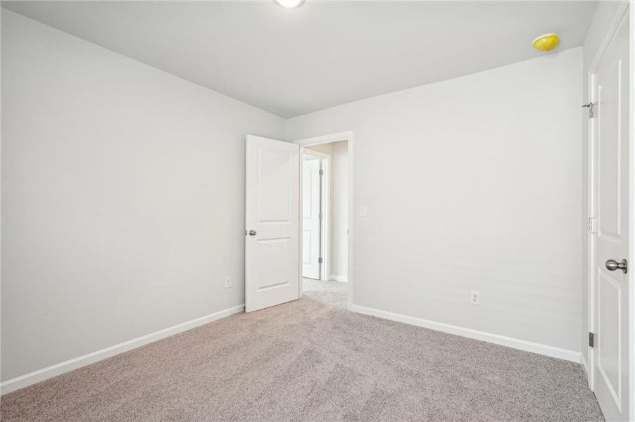 Spacious, unfurnished interior of a new home in Fairview Lake, Conyers (Image 29).