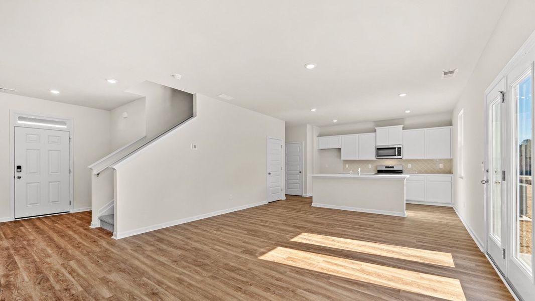 Representative unfurnished interior of a home built from the Flora by D.R. Horton in Poplar Preserve, Newnan (Image 11).