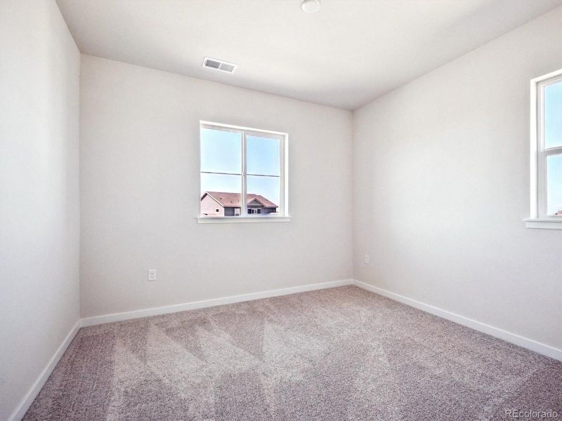 Spacious, unfurnished interior of a new home in Trails at Smoky Hill, Parker (Image 9).
