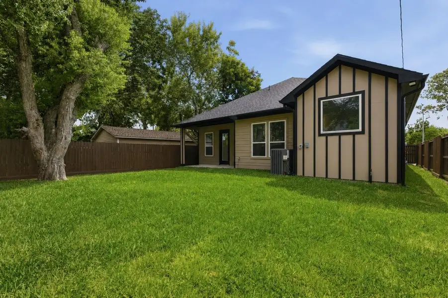 Large, private backyard with plenty of room for children or furry friends to play, plus a spacious covered back porch perfect for relaxing or entertaining. Large, private backyard with plenty of room for children or furry friends to play, plus a spacious covered back porch perfect for relaxing or entertaining.