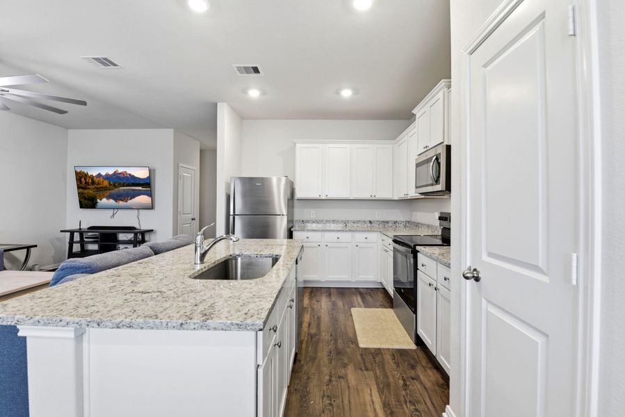 Furnished interior view inside a new home in Vacek Country Meadows, Richmond (Image 10).