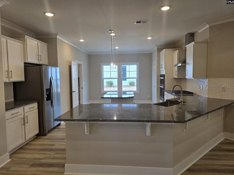 Furnished interior view inside a new home in Collins Cove, Chapin (Image 8). Furnished interior view inside a new home in Collins Cove, Chapin (Image 8).