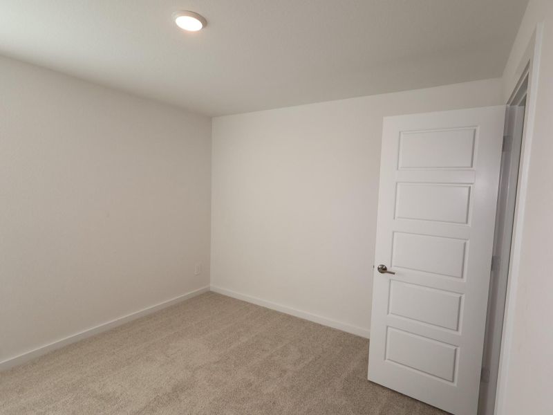 Spacious, unfurnished interior of a new home in Sorella, Tomball (Image 8).
