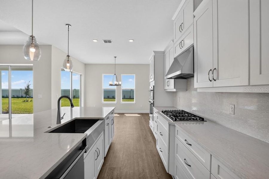 Furnished interior view inside a new home in Coasterra Community Group Page, Palmetto (Image 7).