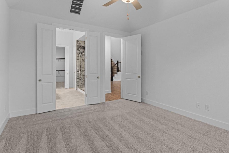 Primary Bedroom with elevated ceiling
