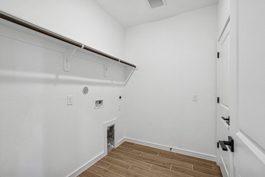 Laundry room (*Photo not of actual home and used for illustration purposes only.)