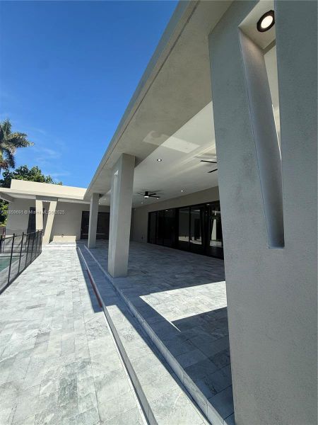 Front exterior of a new home in , Miami, FL, highlighting curb appeal (Image 24).
