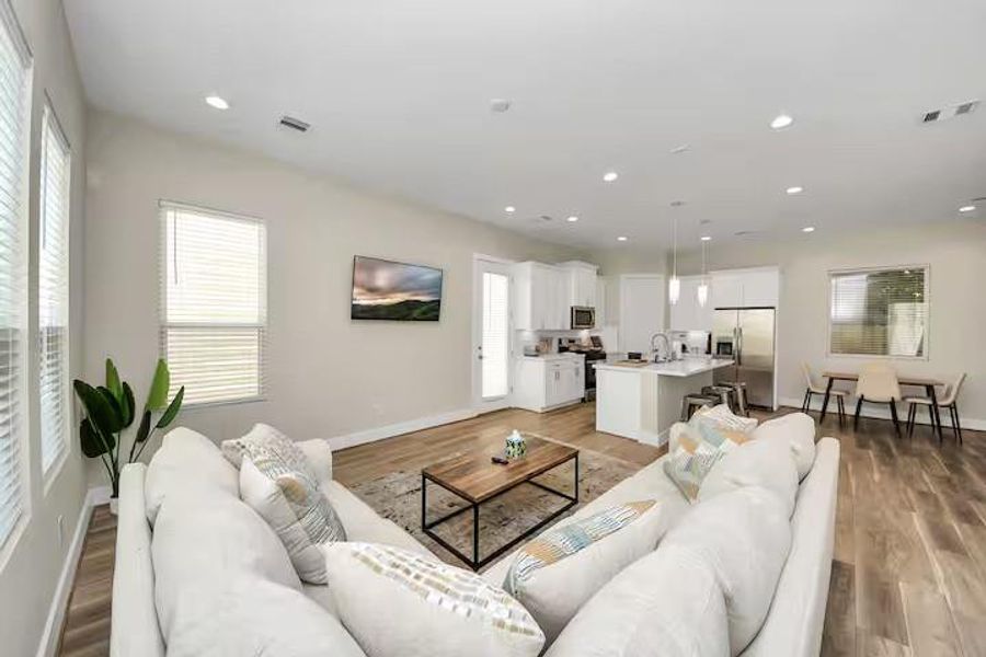 Natural light fills the open living area, giving you plenty of room to relax, host friends, or simply settle in after a long day.