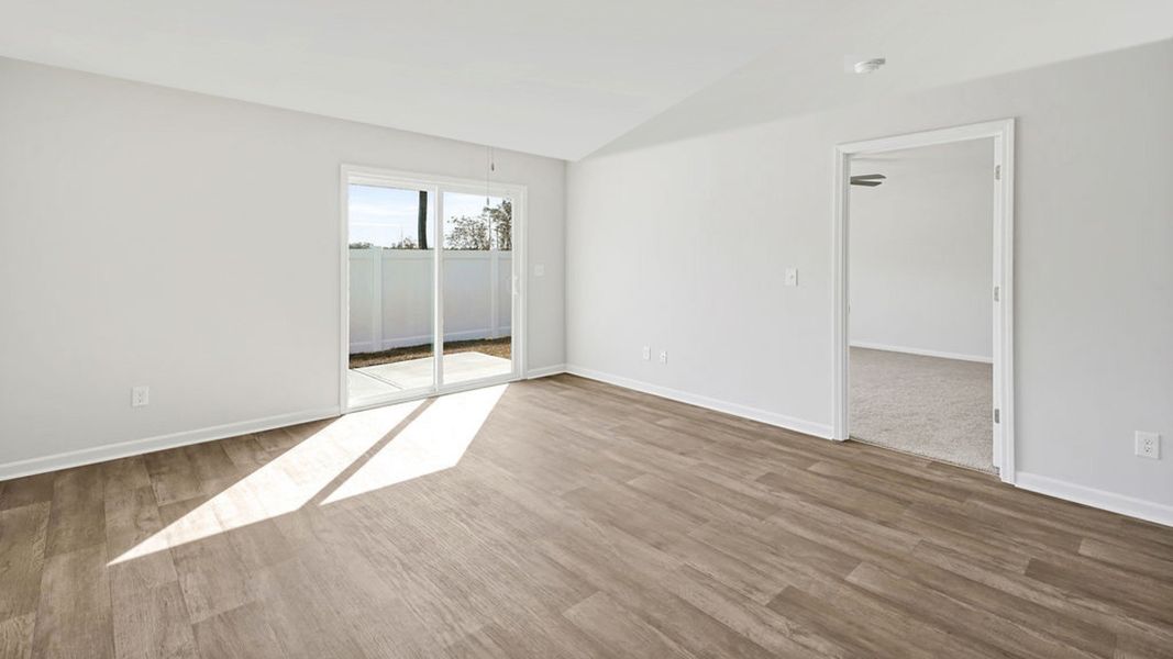 Representative unfurnished interior of a home built from the BAYSHORE by D.R. Horton in Indigo Preserve Townhomes, Leland (Image 17).