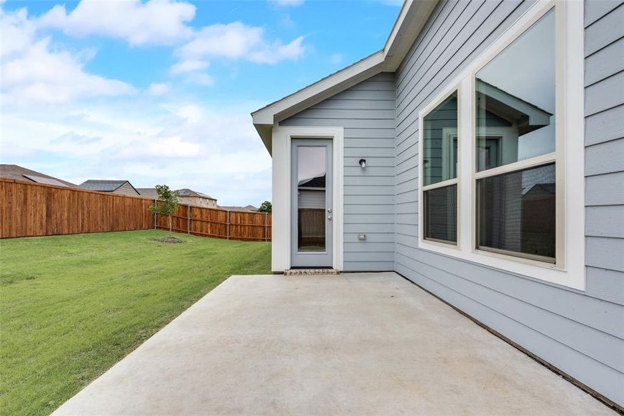 Front exterior of a new home in Creekside of Crowley, Crowley, TX, highlighting curb appeal (Image 18).
