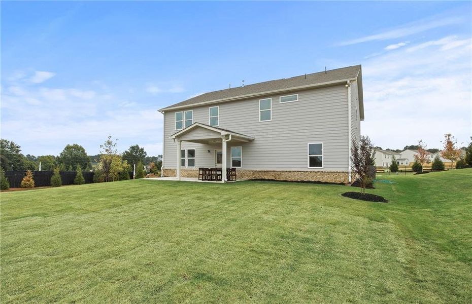 Exterior details and patio area of a home in Anderson Point Estates, McDonough (Image 2).