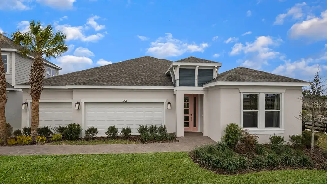 Representative exterior photo of a completed home built from the Bainbridge by Taylor Morrison in Azure at Solaeris, Port St. Lucie, FL (Image 24).