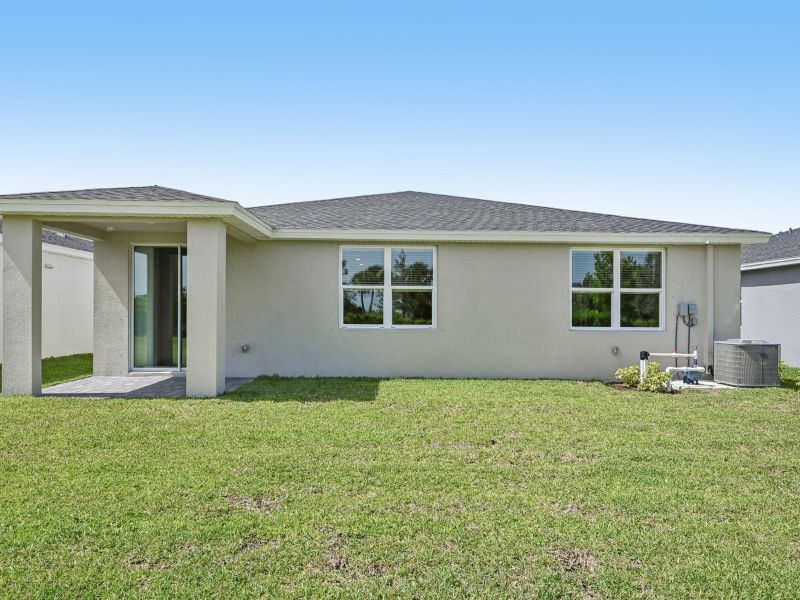 Exterior details and patio area of a home in Hampton Park - Classic Series, Vero Beach (Image 17). Exterior details and patio area of a home in Hampton Park - Classic Series, Vero Beach (Image 17).