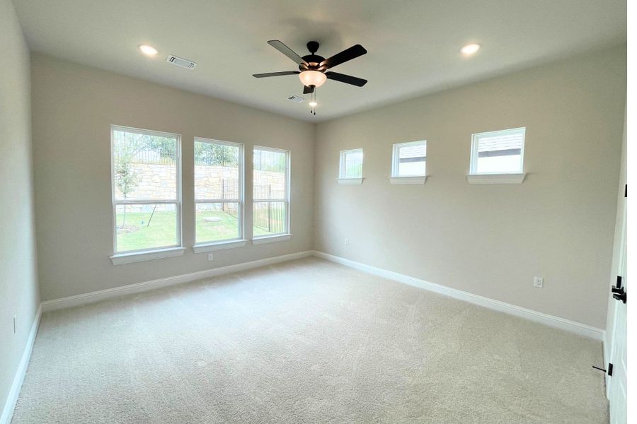 Spacious, unfurnished interior of a new home in Whisper Valley, Manor (Image 27).