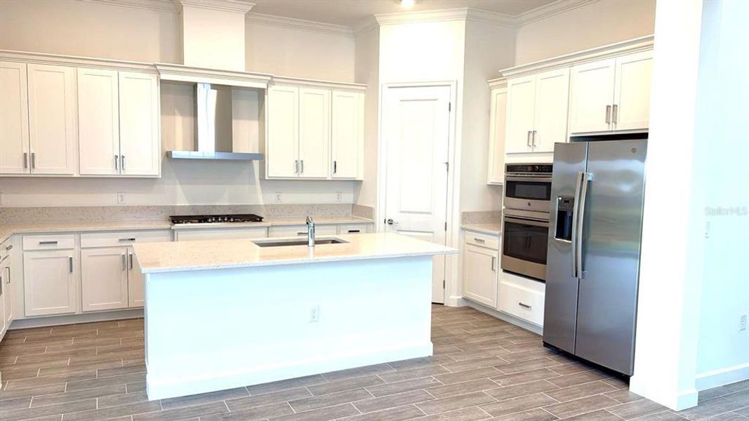 Furnished interior view inside a new home in Tesoro Club, Port St. Lucie (Image 5).